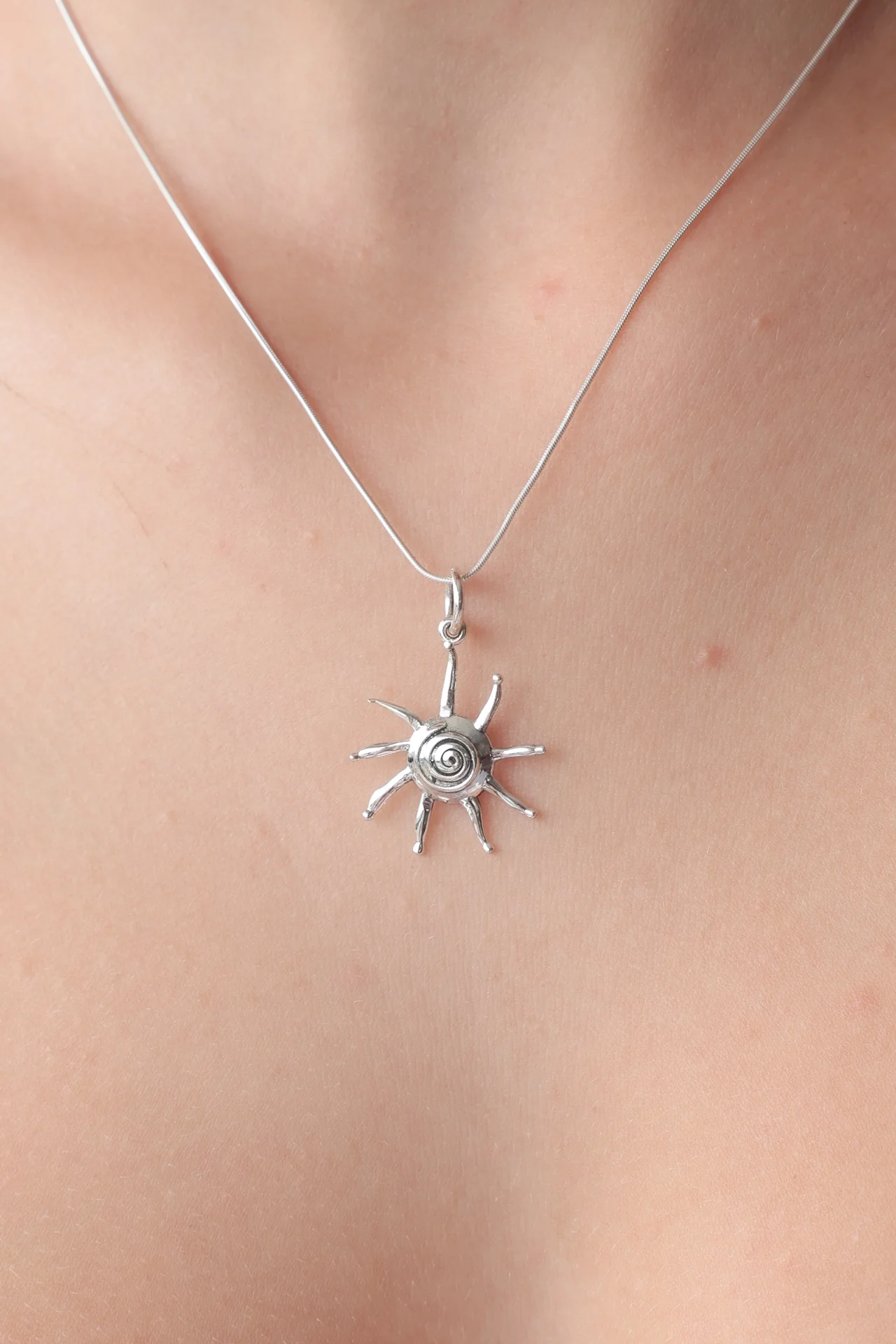 Swirling Sun Pendant